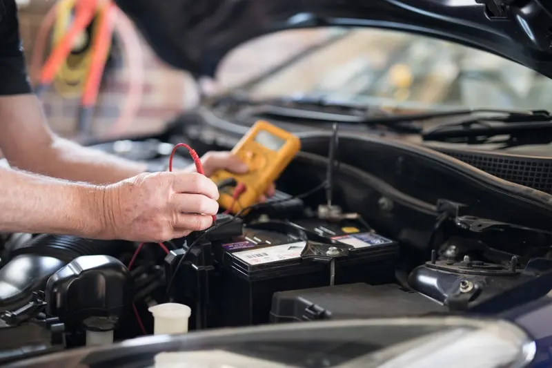 Mechanic checking a car engine ahead of an MOT at MVM Garage Bridlington