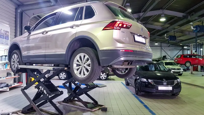 Cars on hydraulic lifts in the workshop at MVM Garage Bridlington